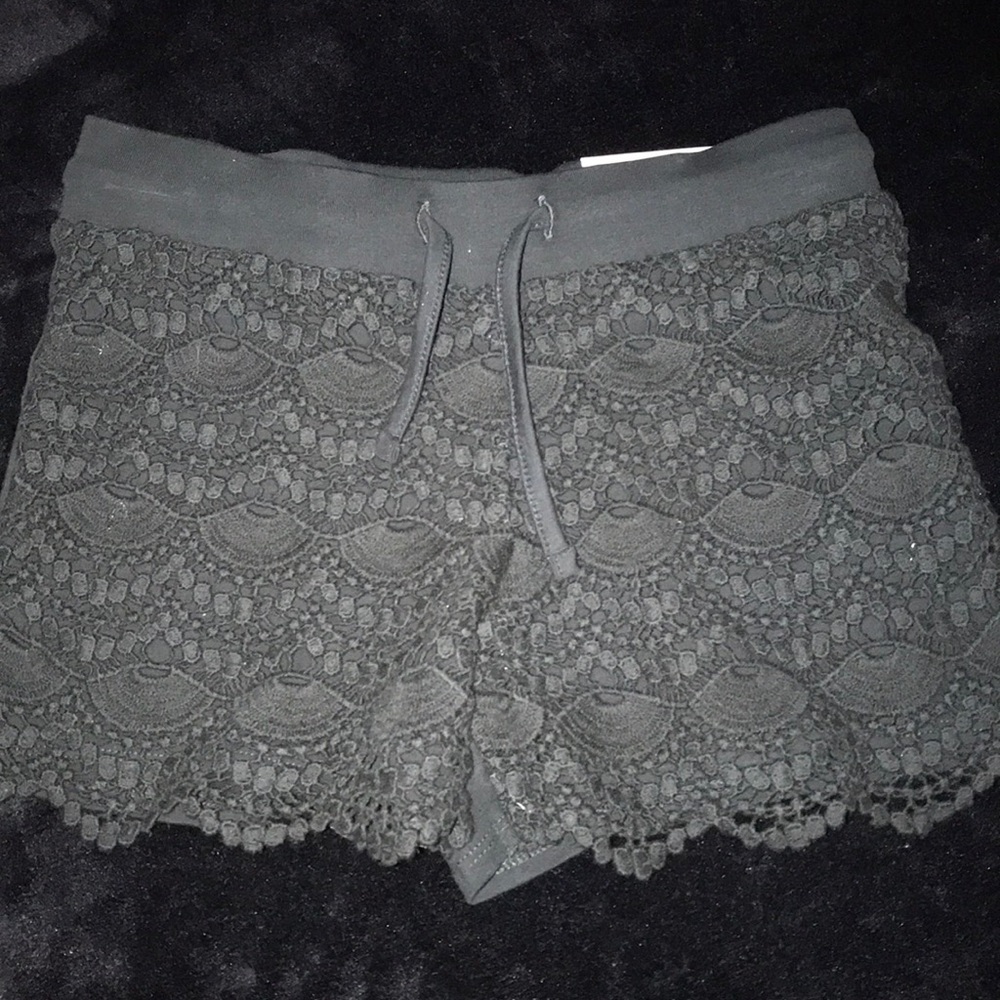 NWT Manguun Black lace front shorts Size M